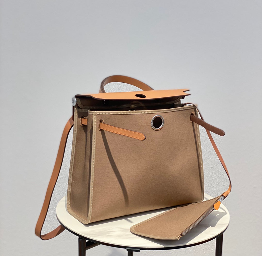 Herbag 31 Toile Brown Canvas Gold Cowhide Leather