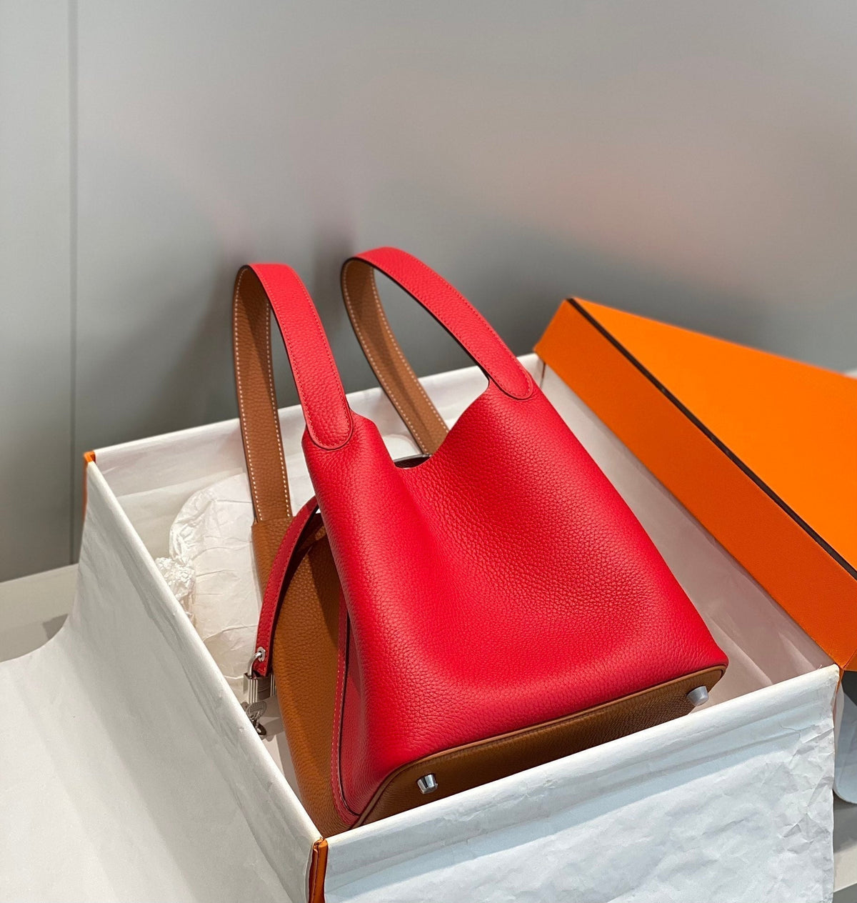 HM PICOTIN LOCK 22 ORANGE AND RED TOGO LEATHER
